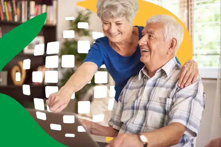 INSS: aposentadoria de R$ 8.475,54 será garantida a alguns beneficiários em 2026 1 Casal de idosos sorrindo enquanto usam um laptop juntos em casa.