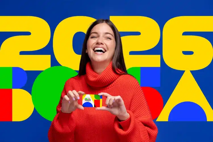 Calendário Bolsa Família maio 2026: datas completas por NIS 1 Mulher sorrindo segurando cartão do Bolsa Família com fundo colorido e números 2026