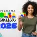 Pagamentos do Bolsa Família seguem nesta semana — confira seu NIS 12 Mulher sorrindo segurando cartão do Bolsa Família com destaque para 2026 e notas de dinheiro ao lado